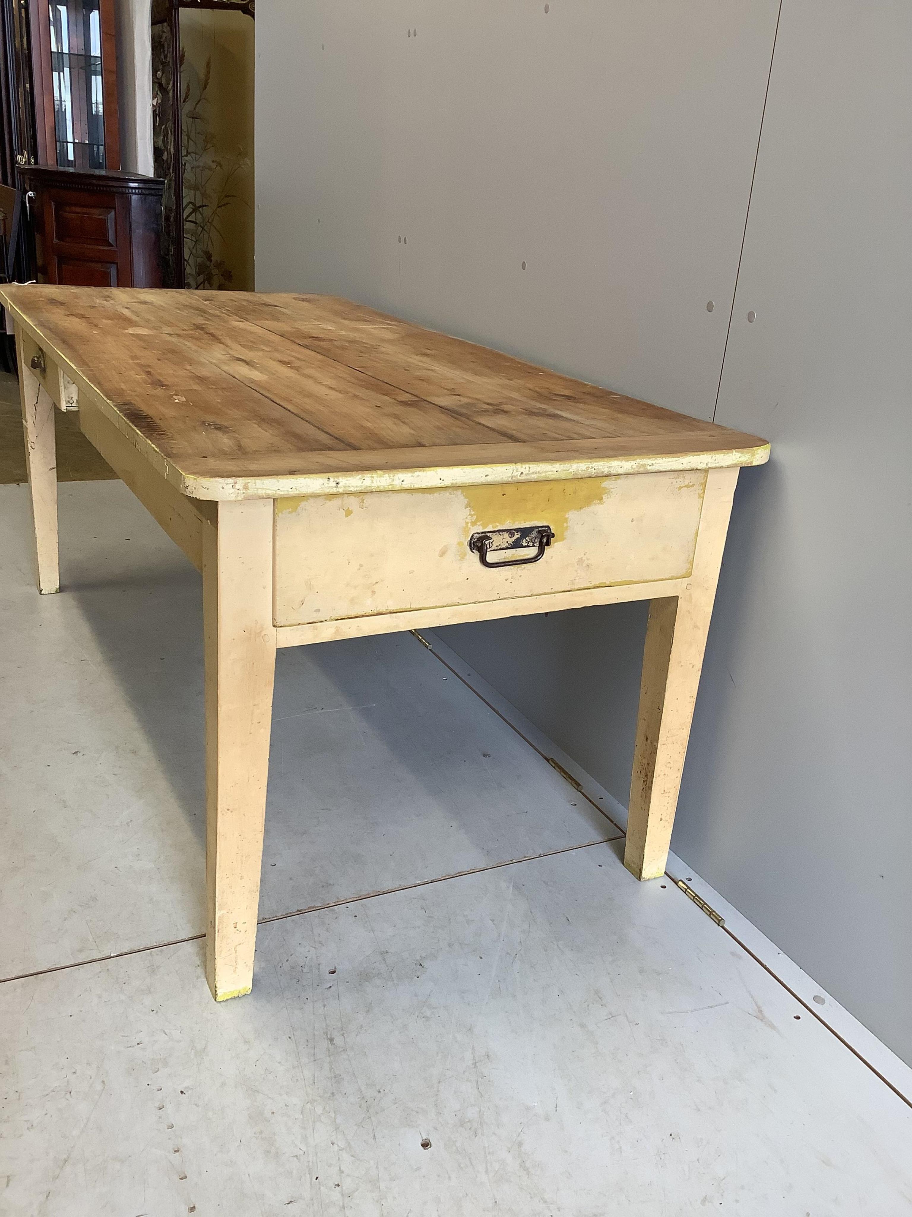 A 19th century French rectangular cherry kitchen table, width 169cm, depth 83cm, height 73cm. Condition - poor, base later painted